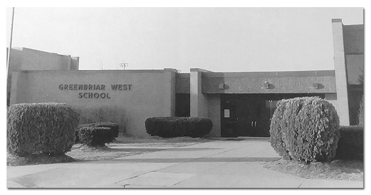 Black and white photograph of the main entrance to Greenbriar West Elementary School. The date the photograph was taken is unknown. 